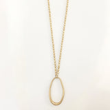 Long Adjustable Necklace with Worn Metal Oval