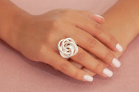 Stretch ring w/ Matte Silver Swirl flower Design